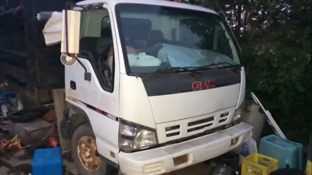 Vintage 2006 dump truck. ISUZU NPR - 1 - 1734474505854_Dumptruck1