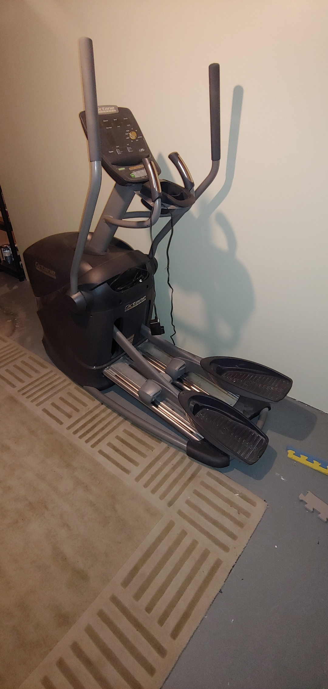 Octane Elliptical trainer  - 2 - 1737240968848_elliptical on plain wall