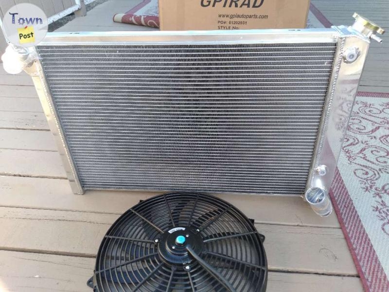 1969 to 1972 three core aluminum radiator with fan Brand new never been installed original packaging  - 1 - 998667-1706303274