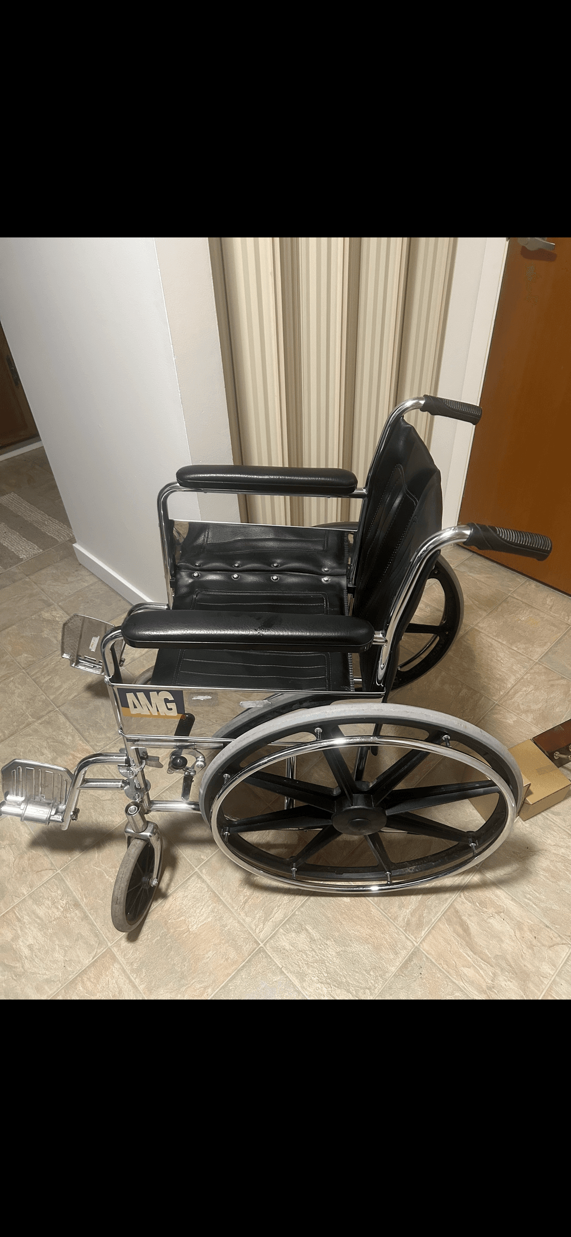 Photo of Wheelchair, $150.