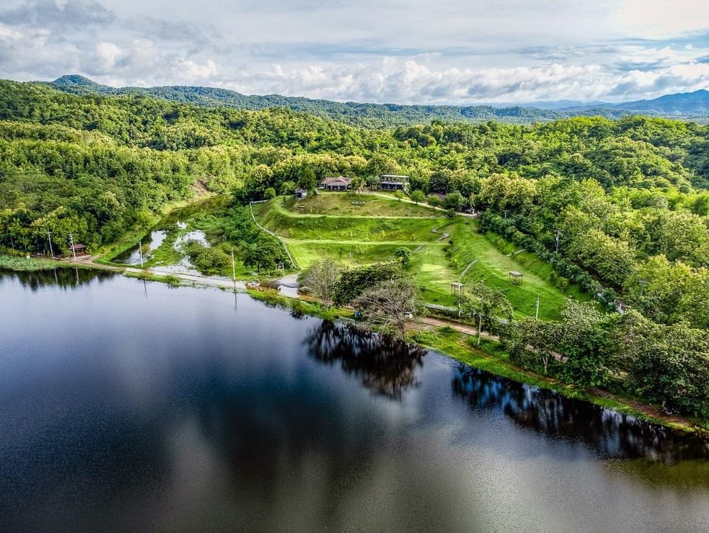 Photo of The Best Feng Shui House For Sale in Thailand, surrounded by teak mountains.