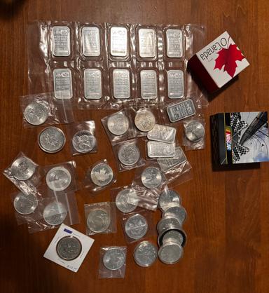 Photo of Silver coins and bars - 1