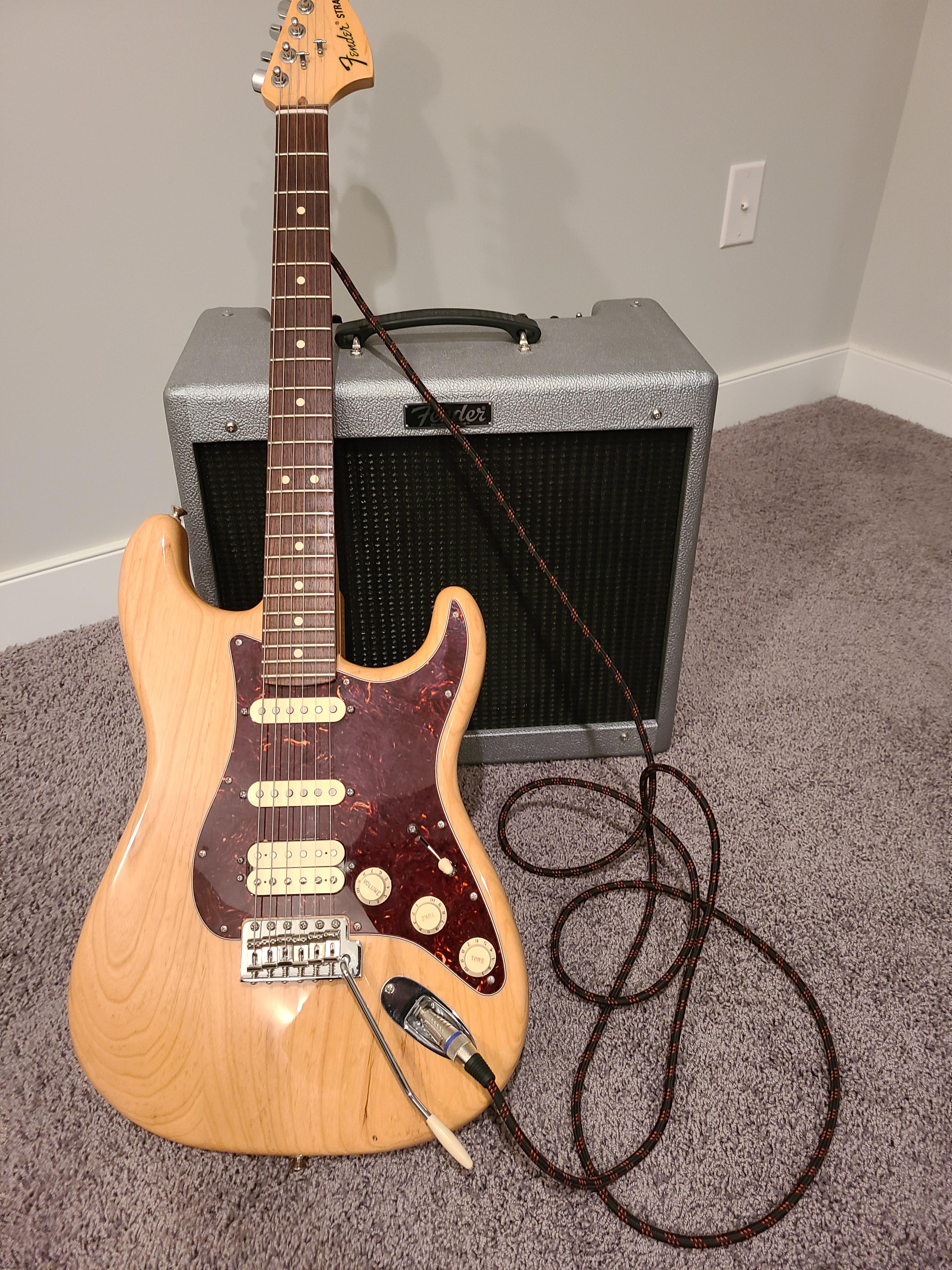 Photo of Fender Stratocaster FSR electric guitar with Fender blues junior lll tube amp