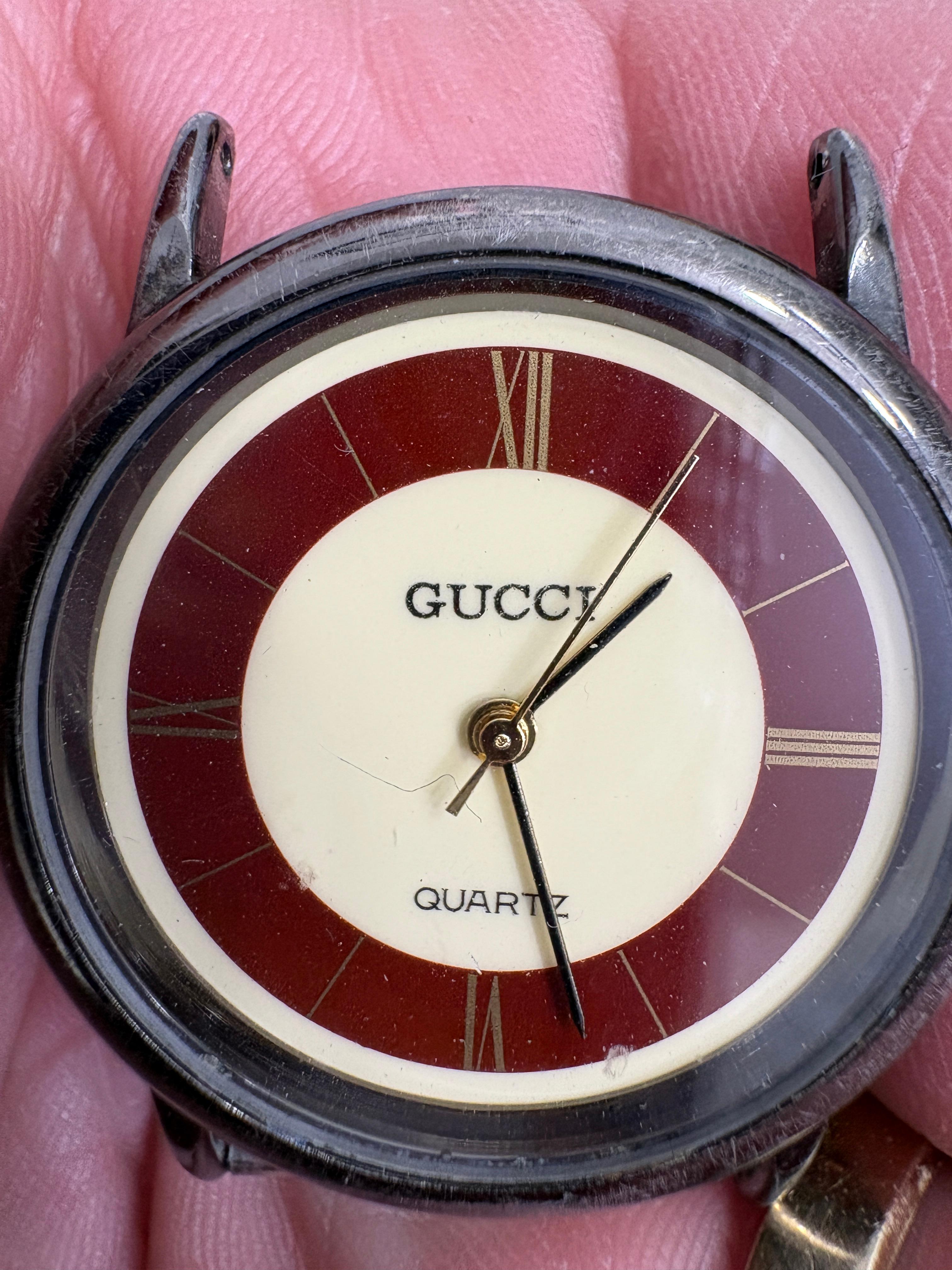 Photo of Vintage Gucci quartz watch face 