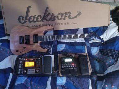 Photo of Electric guitar and 2 effects processor Jackson 24frett zoom gix4 pedal 1 mooer distortion pedal - 1