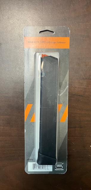 Photo of Brand new Glock 17/19/19X/26/34 Magazine 9mm 10/33 Rounds Black w/Orange Follower $90