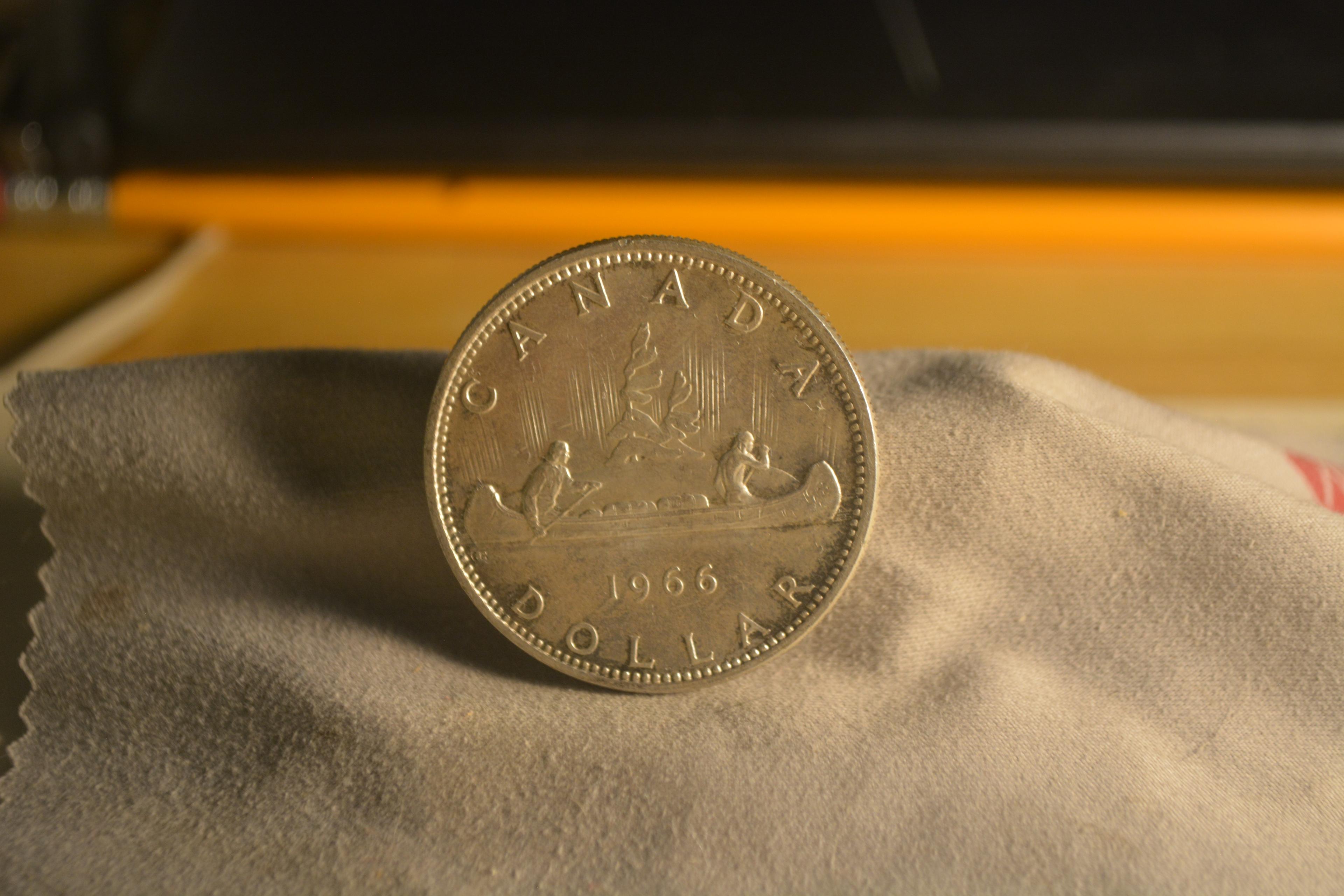 Photo of canoe silver coin 1966