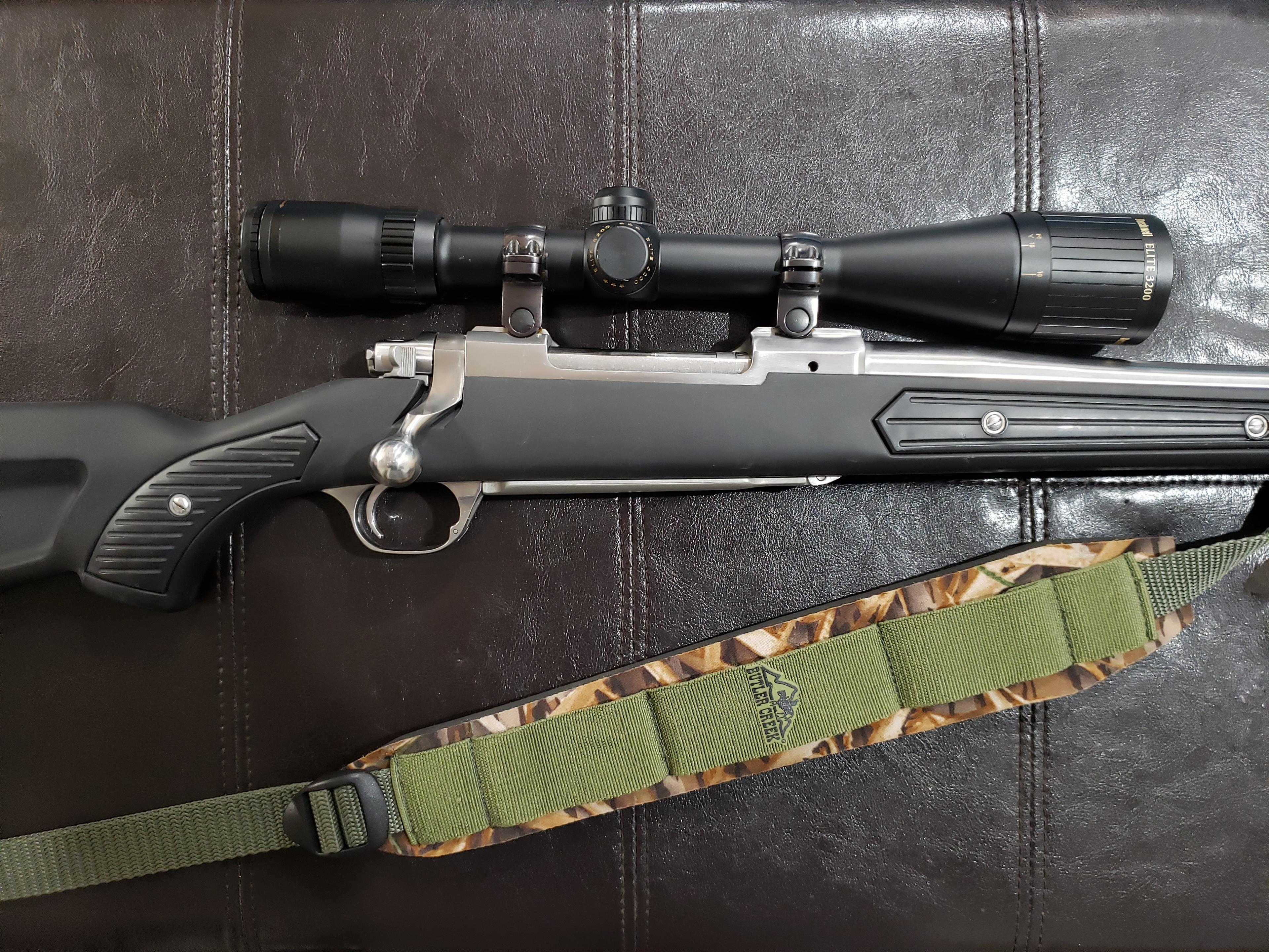 Photo of Ruger M77 Mark II Zytel (Boat Paddle Stock) .30-06 Stainless/Synthetic Bolt-Action Rifle w/ Bushnell Elite 3200 Scope & Sling