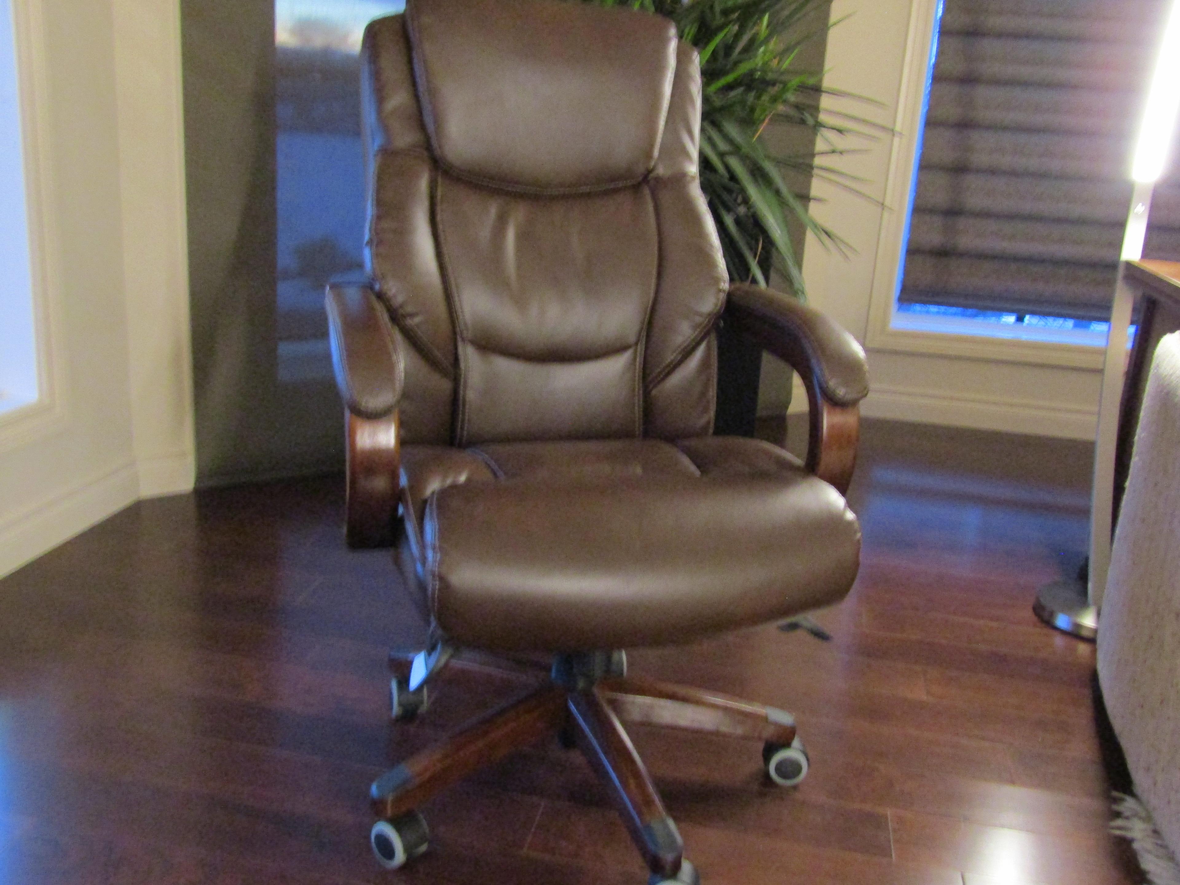 Photo of Four leather office chairs