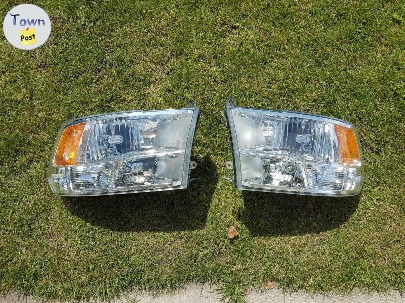 Photo of Factory Head Lights with bulbs for Ram 1500 fits 2009 / 10 and 11 Ram Trucks.