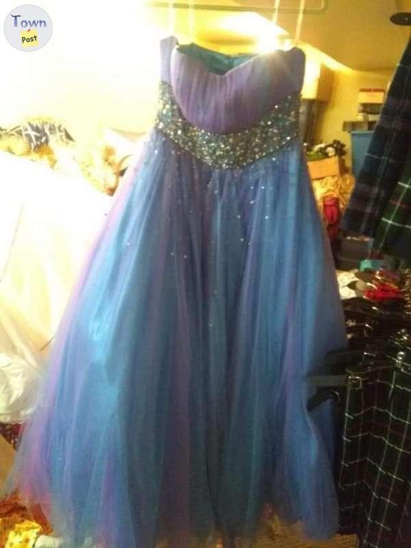 Photo of Purple iridescent strapless grad/prom dress