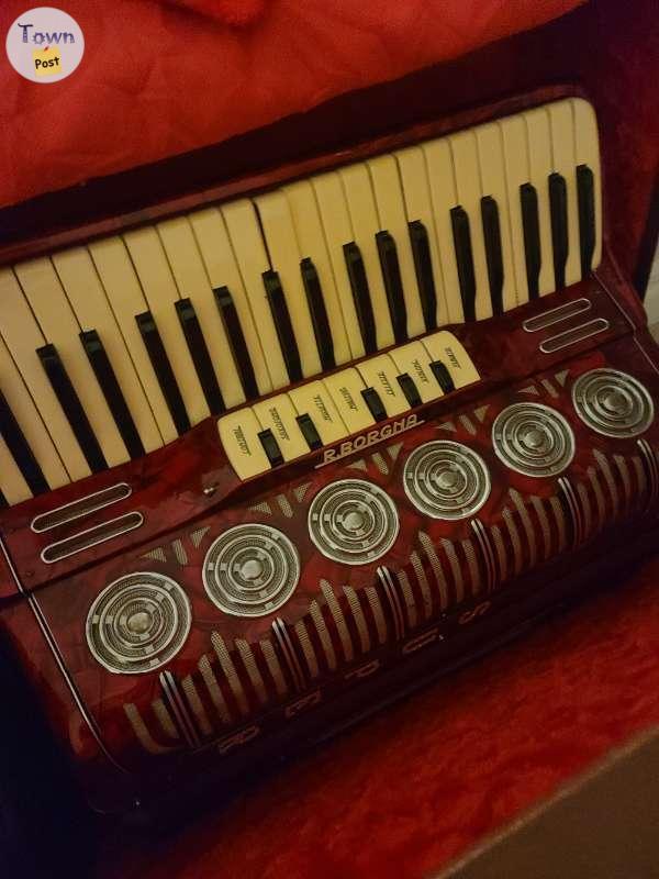 Photo of Old Accordion red