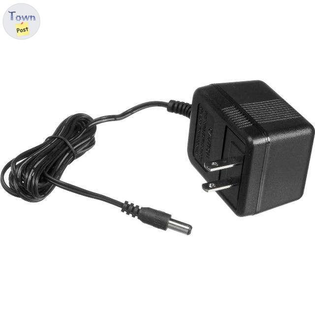 Photo of AC-AC and AC-DC power adapters