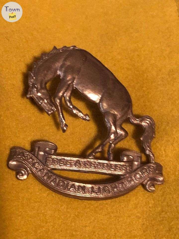 Photo of World War II era 14th Canadian Light Horse Cap badge