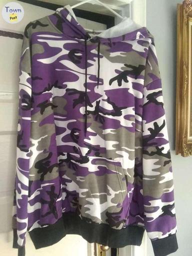 Photo of Purple and pink camouflage items  - 1