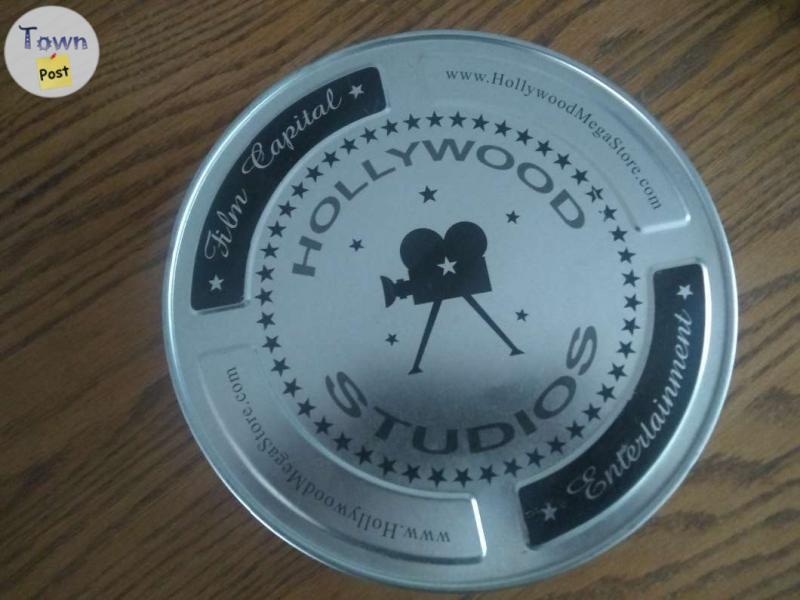 Photo of Movie reel tin,Glass,& piggy bank 