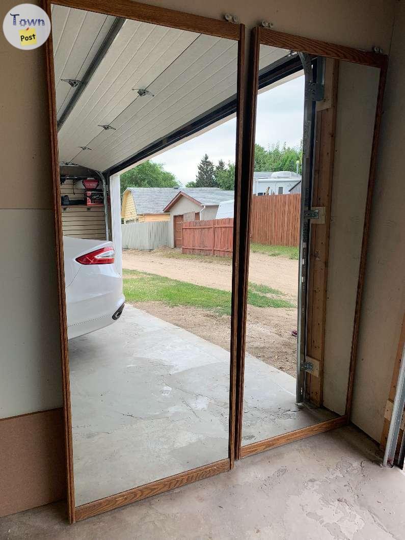 Photo of Set Of Mirrored Closet Doors