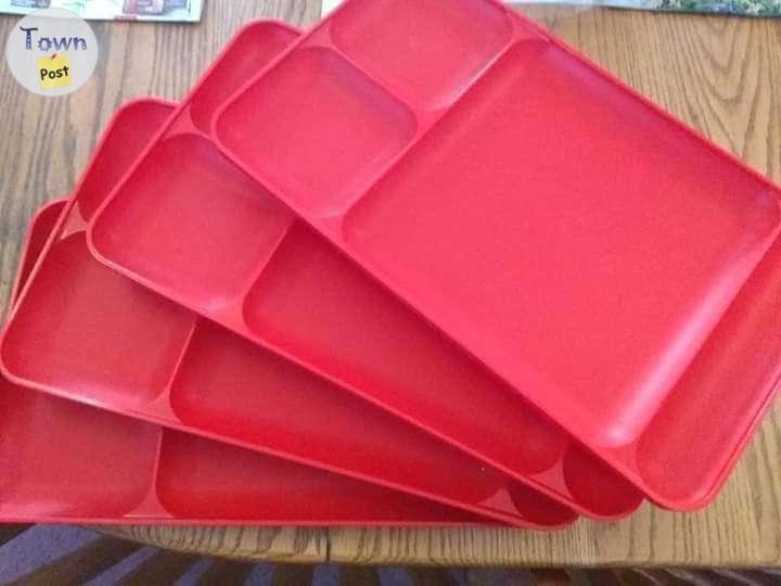 Photo of Red colored Tupperware 