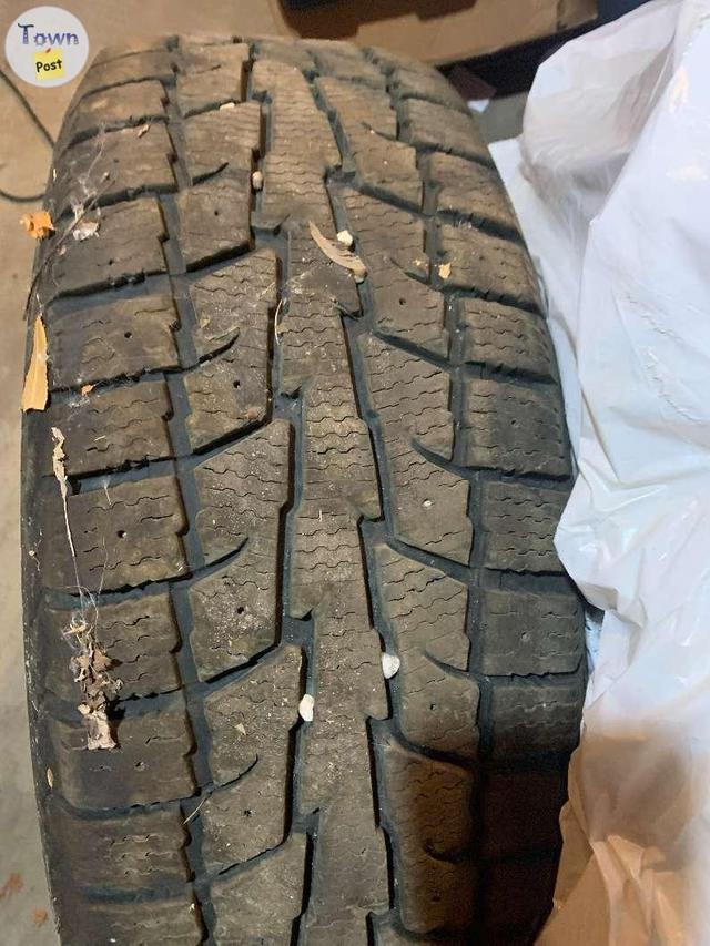 Photo of Snow tires on rims