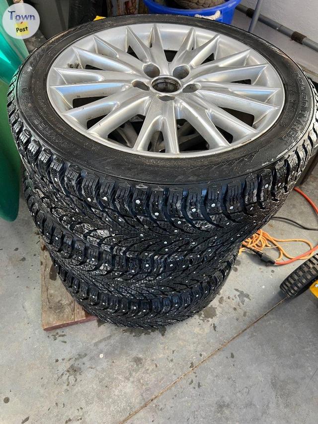 Photo of Nokian Studded Winter Tires and Rims 235/45 R18