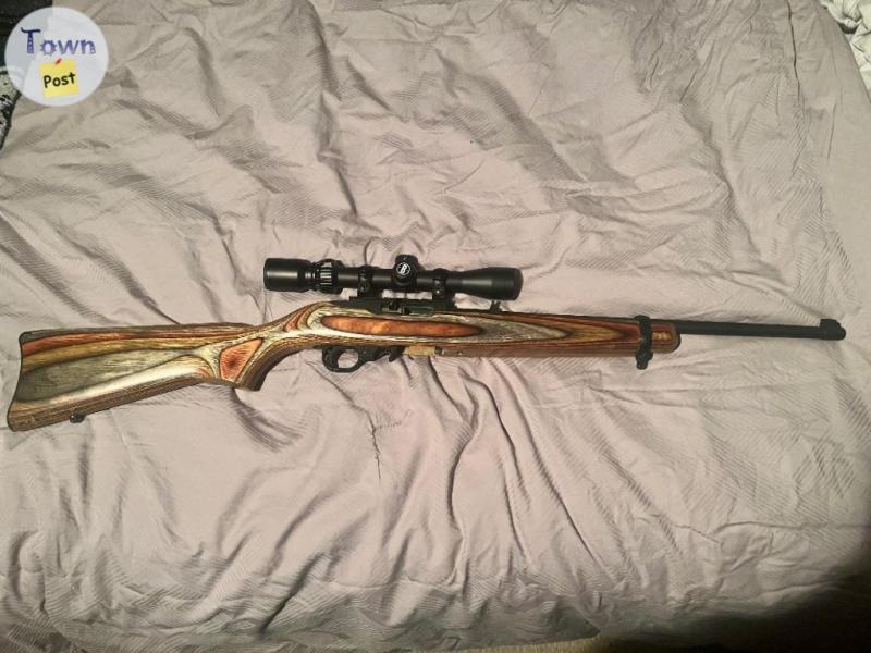 Photo of Ruger 10/22 with factory laminate stock. 