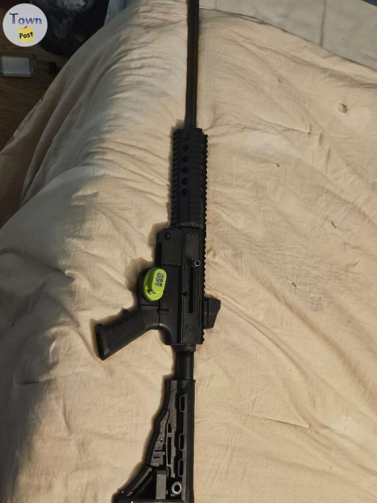 Photo of Jr 9mm carbine with red dot sights