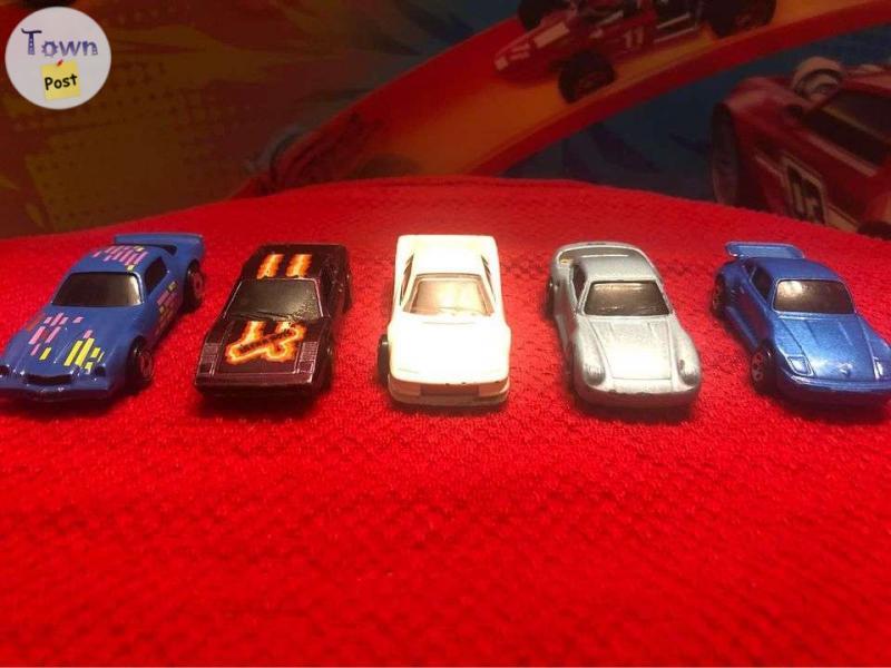 Photo of Assorted 80s Hot Wheels Camaro Ferrari Porsche cars.