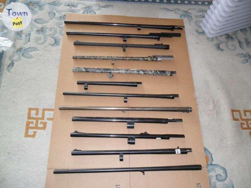 Photo of Various shotgun barres for sale.