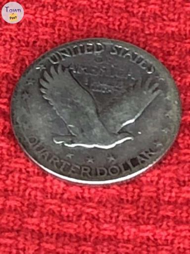 Photo of 1930 American 25 cent silver piece coin. - 1