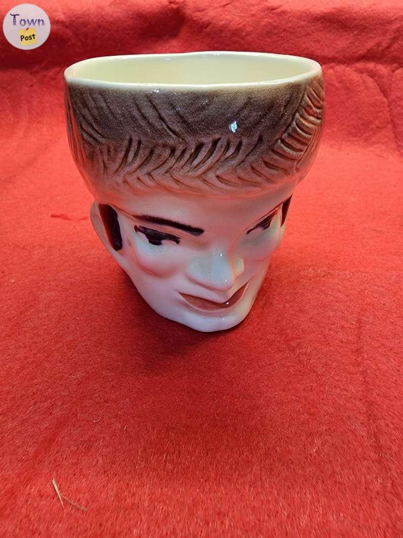 Photo of Davey Crockett collector mug. 