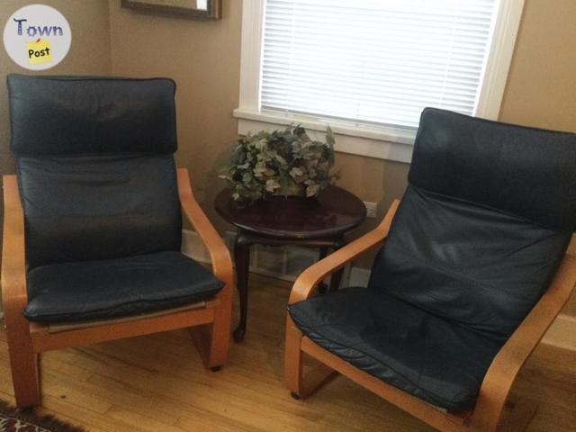 Photo of Two IKEA Poang Dark Navy Leather Chairs