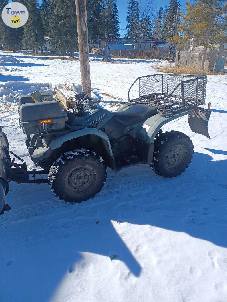 Photo of 2005 Yamaha 450 Grizley,warn snow blade,runs great..