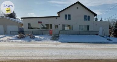 Photo of Title Commercial Building with 2 Bdrm Suite For Sale by Owner - 1