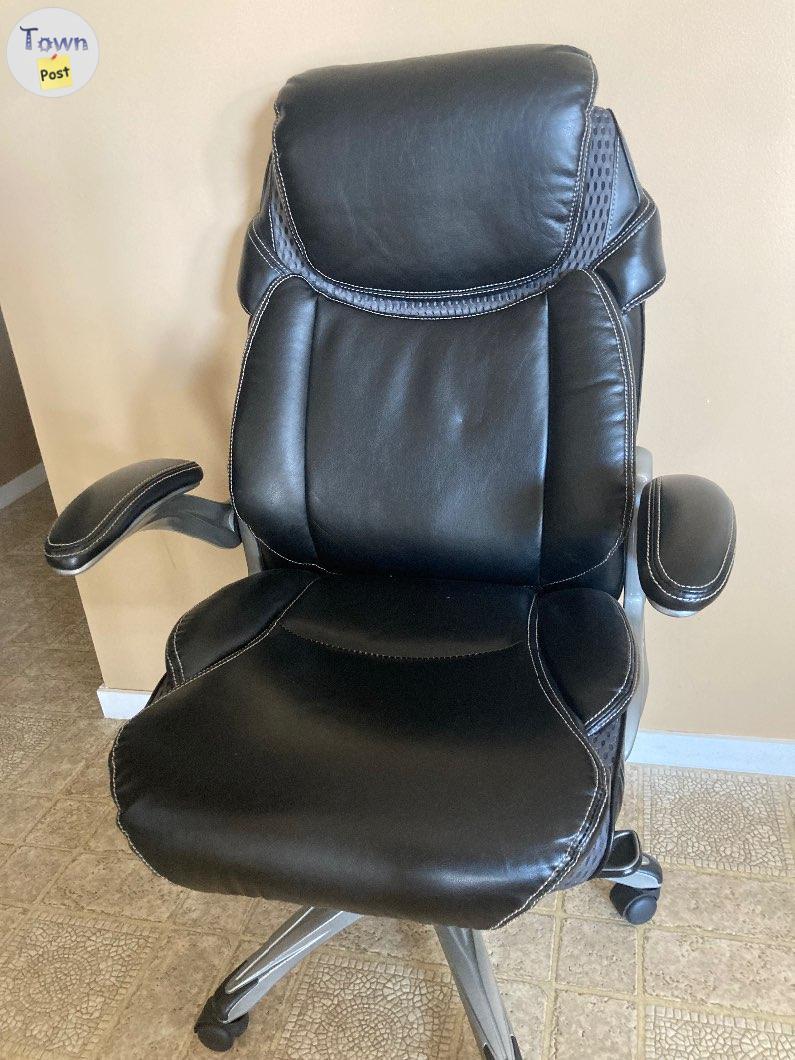 Photo of Black leather desk chair