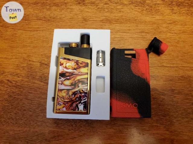 Photo of Smok Trinity Alpha Prism Gold with Pod, New 0.6 Coil, and Silicone Case