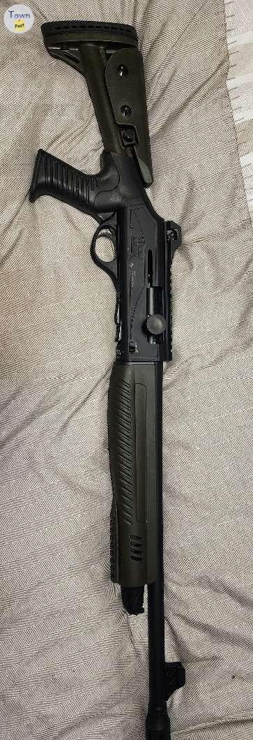 Photo of New semi auto 12ga. Never fired.