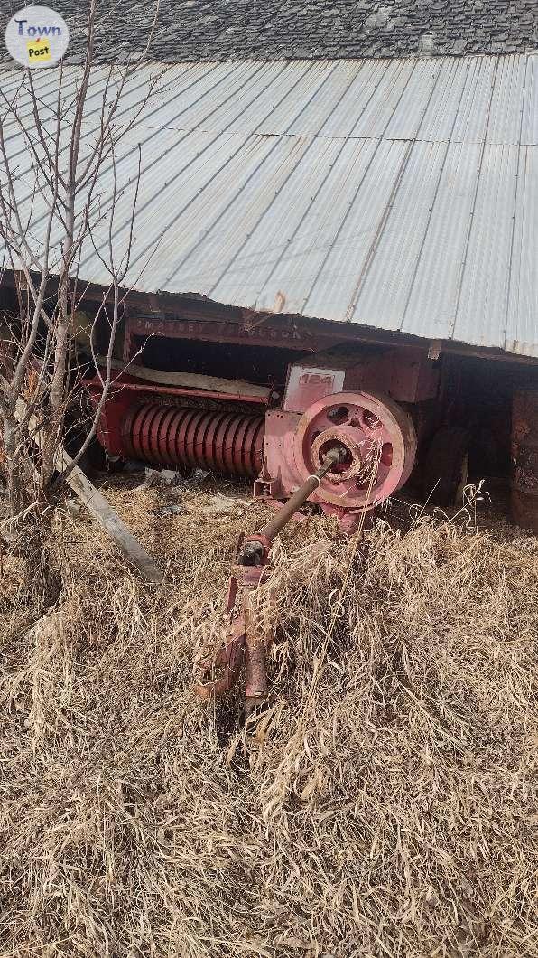 Photo of 124 Massey Ferguson baler. 