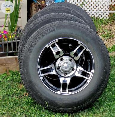 Photo of 10 ply tire and rims pkg - 1