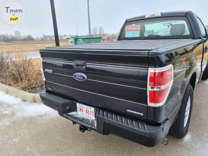 Photo of 14 ford f150 near showroom condition