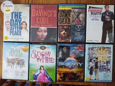 Photo of Previously viewed DVDs from old movie rental places - 2