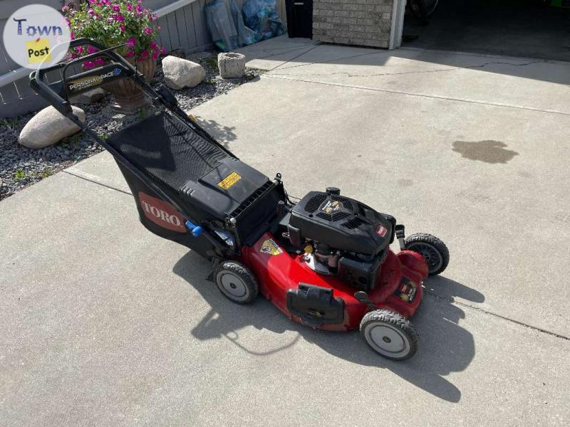 Photo of Toro 21", Personal Pace, Electric Start Lawnmower