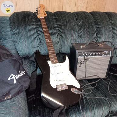 Photo of Fender 6 string guitar - 2