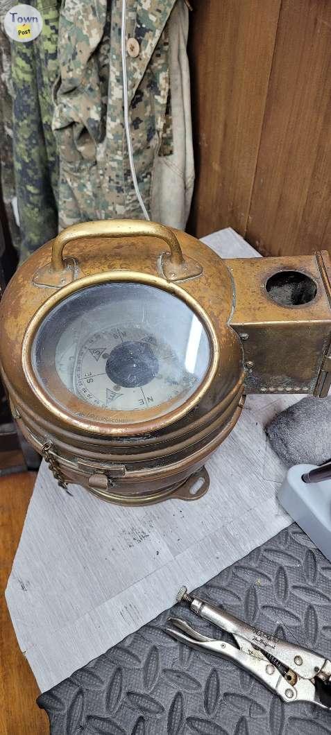 Photo of Ships compass from early 1900s red brass 