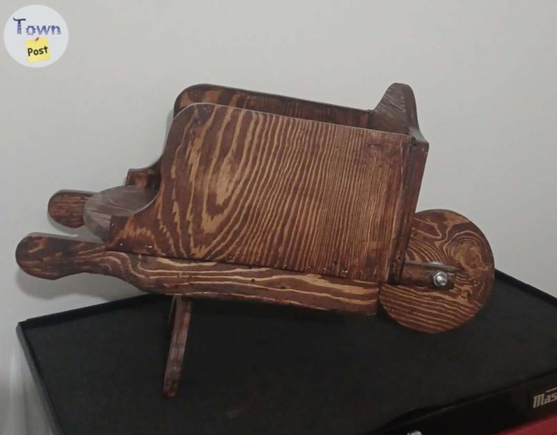 Photo of Wooden  wheelbarrow 