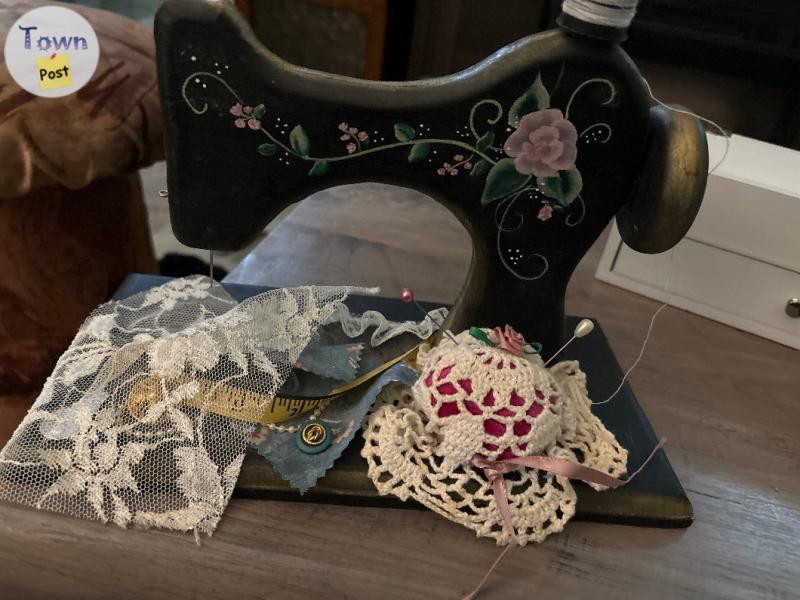 Photo of Pretty wooden sewing machine