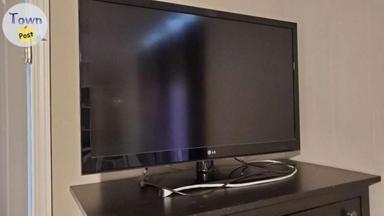 Photo of LG TV with stand - 1