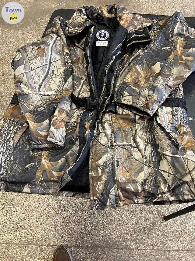 Photo of camo mustang floater coat