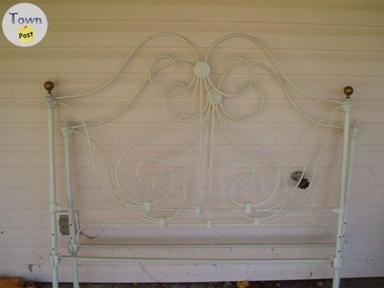 Photo of antique bed posts - 2