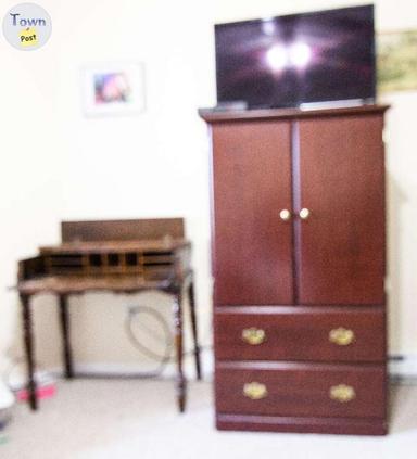 Photo of TV Armoire and Antique Desk - 1