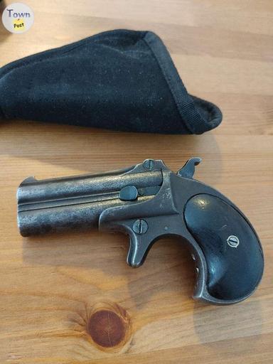 Photo of Antique remington 95 derringer. - 2